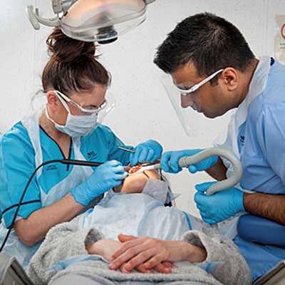 Patient being treated in dental surgery